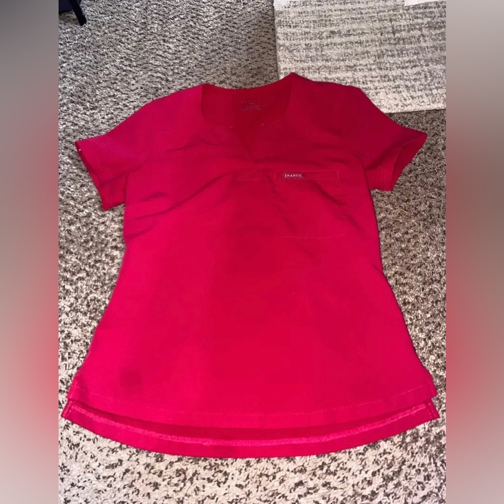 Size XS bright pink jaanuu scrubs lightly worn